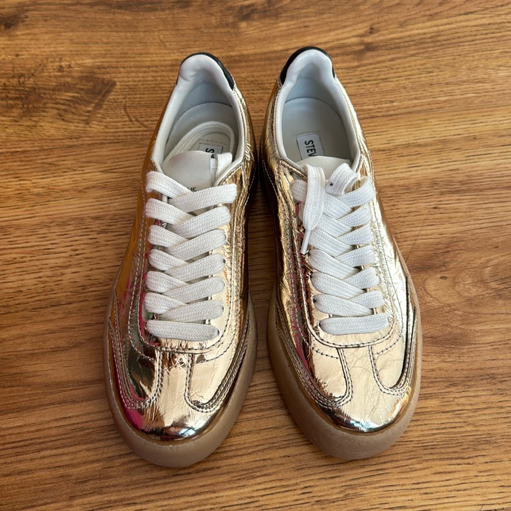 Brand new Steve Madden Gold TUX Sneakers